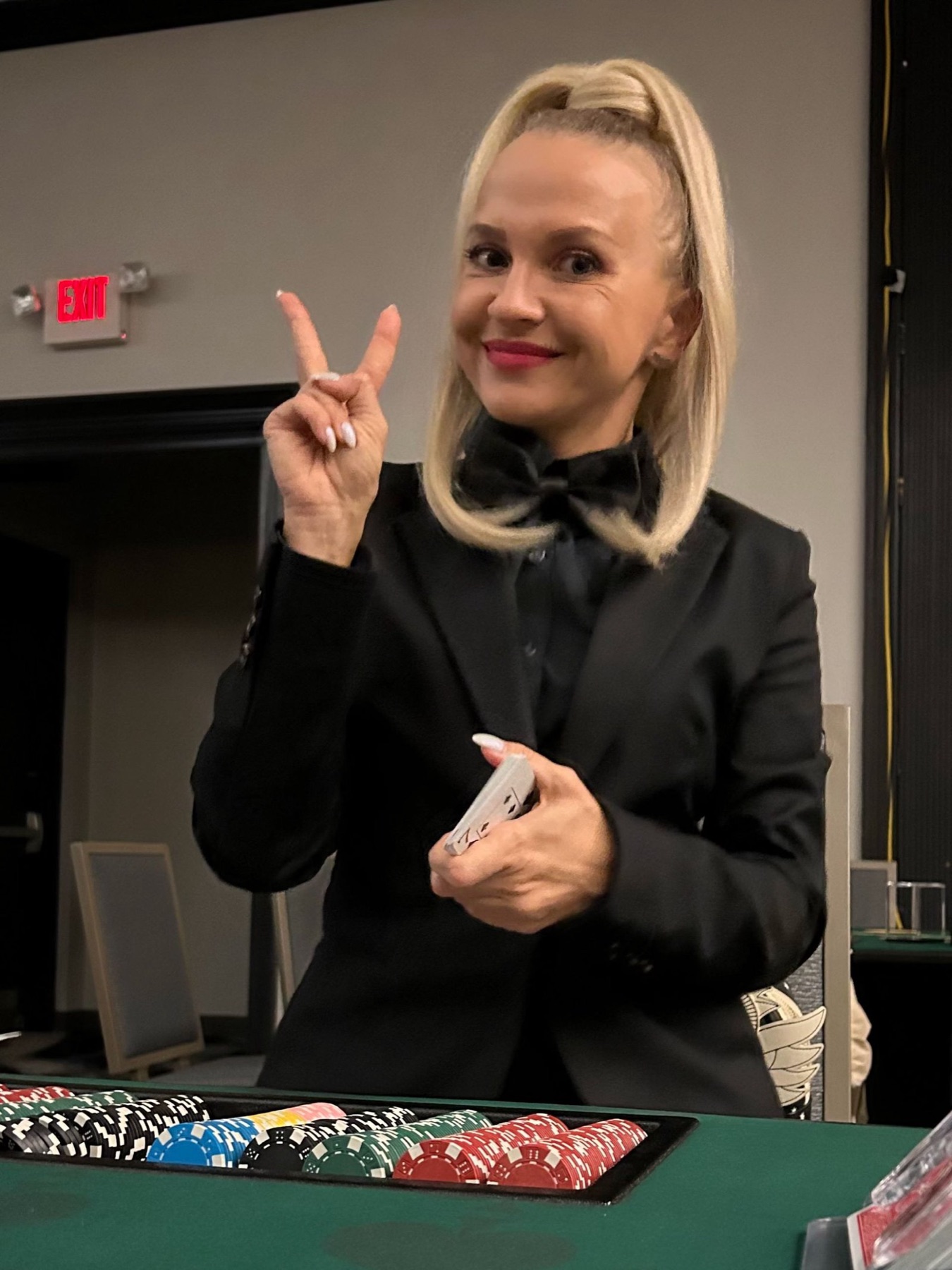 One of our dealers in black tie at a corporate gala